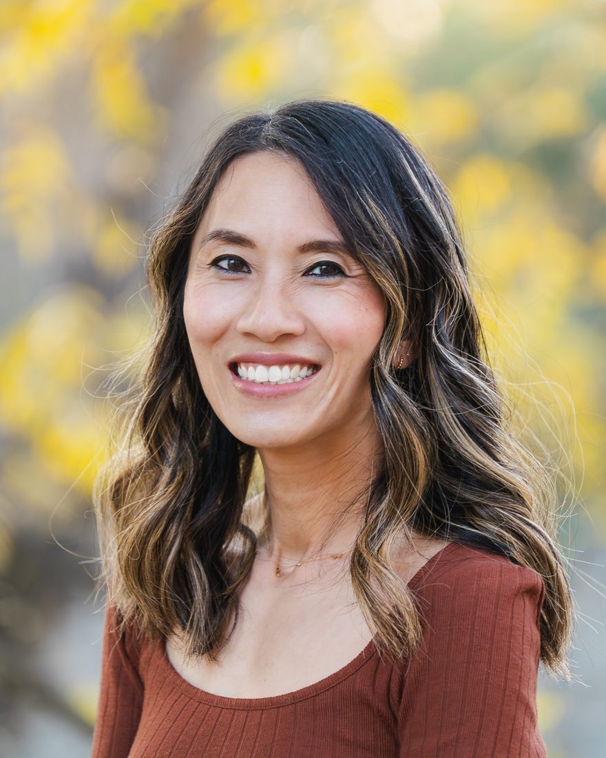 Sharon Go, LMFT, smiling outdoors